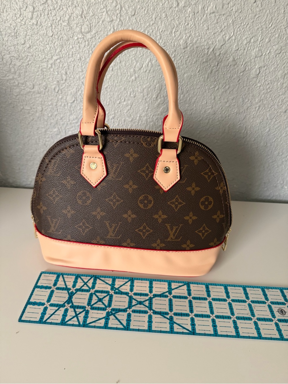 Brown Monogram Dome Satchel with Pink Trim